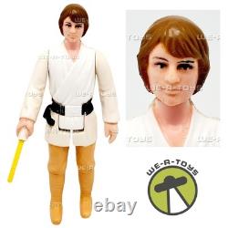 Vintage Kenner 1977 Star Wars Farmboy Luke Skywalker Action Figure with Brown Hair