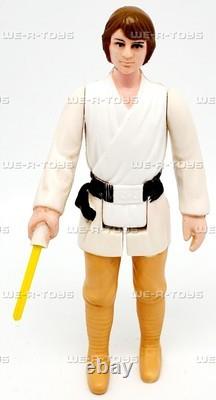 Vintage Kenner 1977 Star Wars Farmboy Luke Skywalker Action Figure with Brown Hair