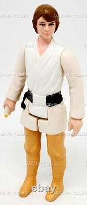 Vintage Kenner 1977 Star Wars Farmboy Luke Skywalker Action Figure with Brown Hair