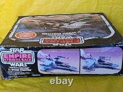 Vintage Star Wars BATTLE DAMAGED X WING FIGHTER w box working Kenner 1978